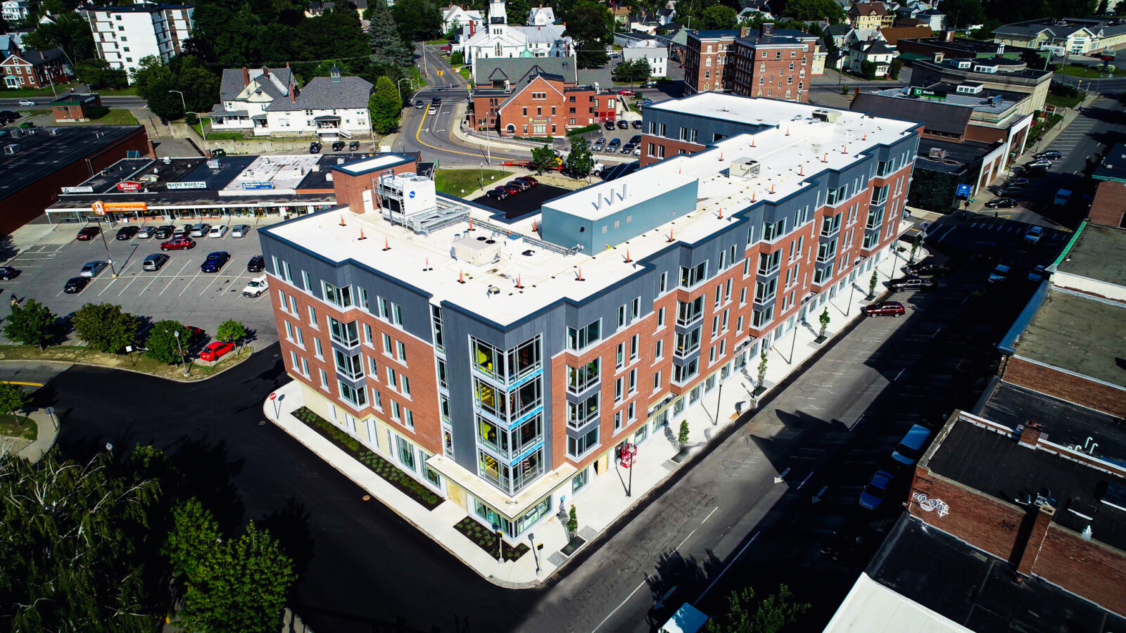 Angled aerial view of the Colby College brick dorms