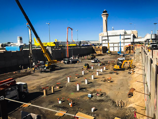 Construction crew working on additions to the outside of Denver International Airport