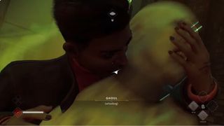 《吸血鬼：化装舞会 - 血统 2》扩展游戏内容截图，显示 Phyre 正在咬住人体模型的脖子