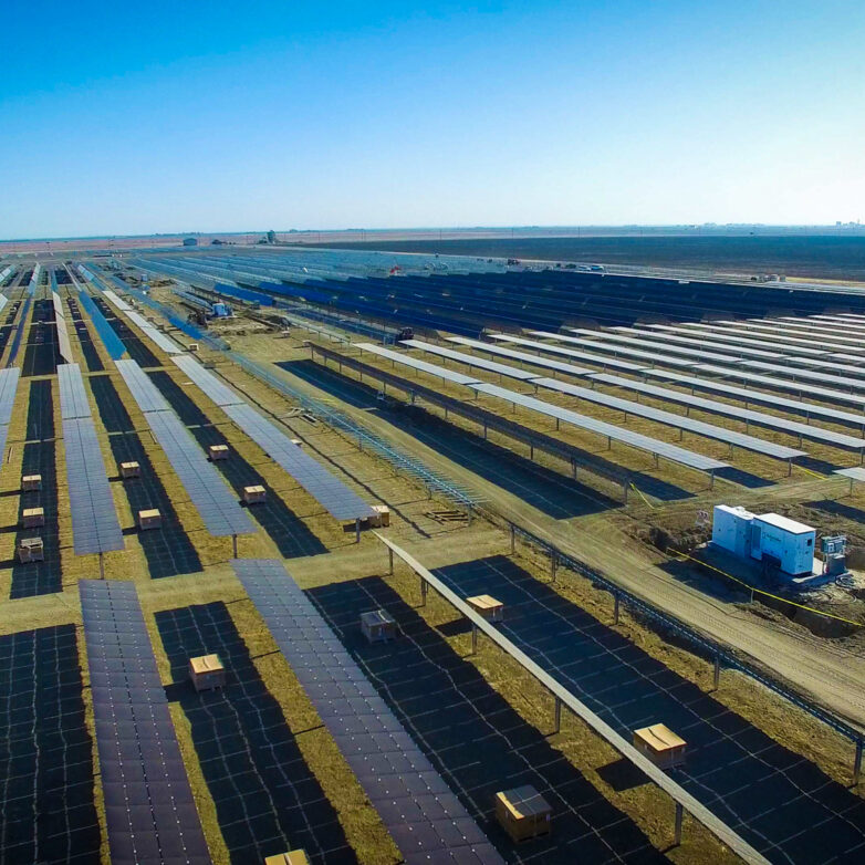 Large field with many rows of solar panels